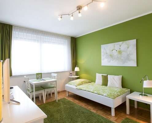 Bequemes Bett in unseren Apartments in Klagenfurt